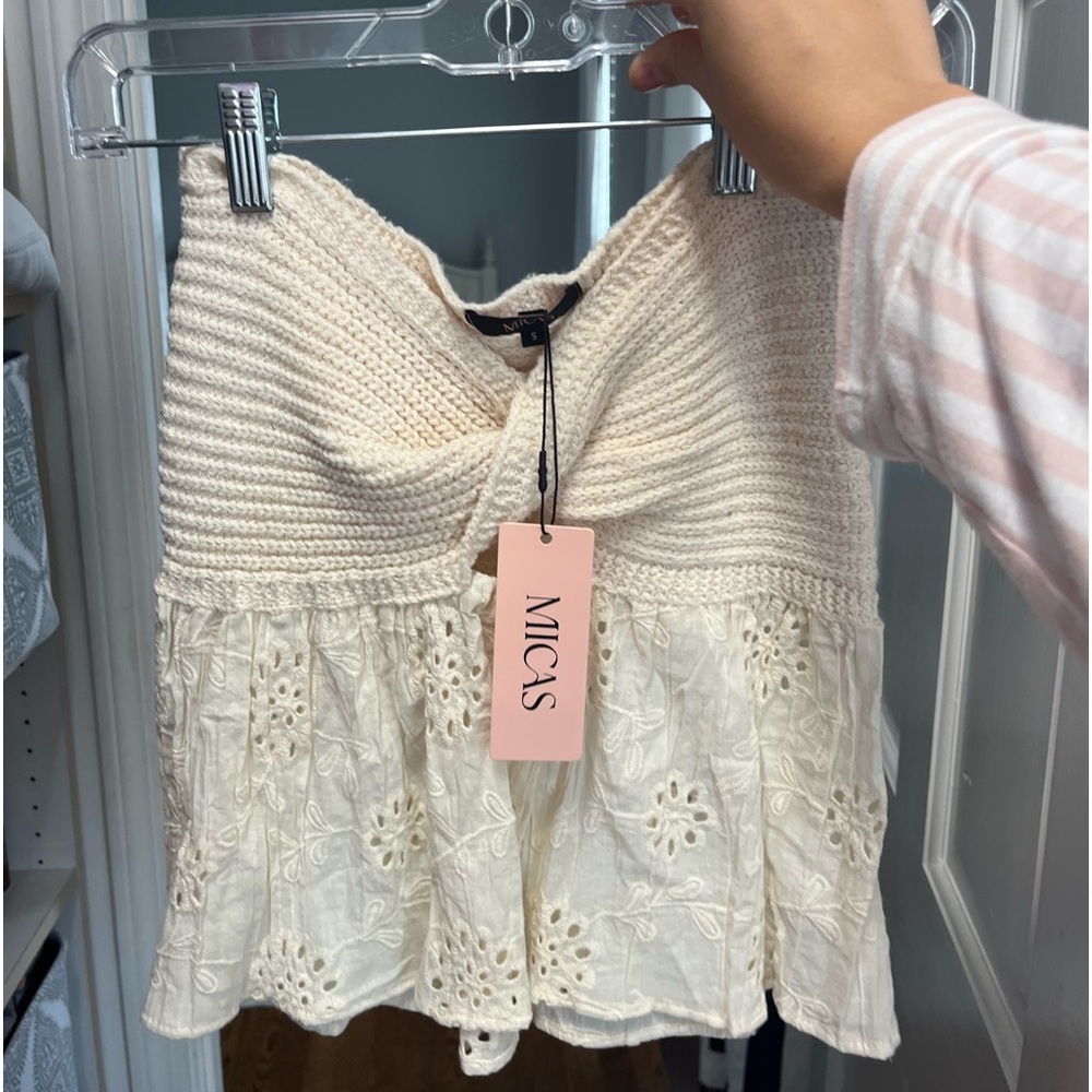 Tubed twisted top